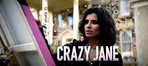 a woman painting with the name crazy jane on the bottom right