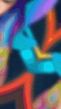 a close up of a colorful painting with a rainbow of colors