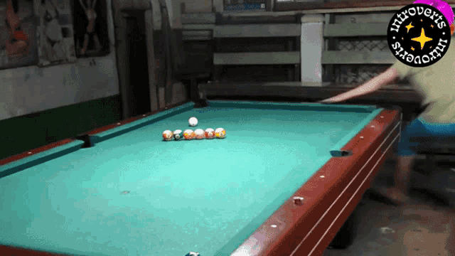 a pool table with the words introverts on the bottom