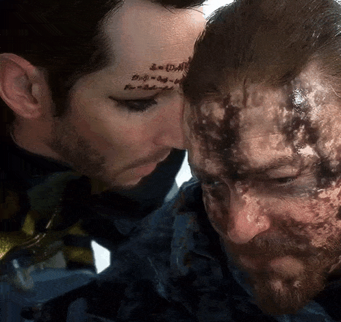 a man with a tattoo on his forehead that says ' i = d = a '