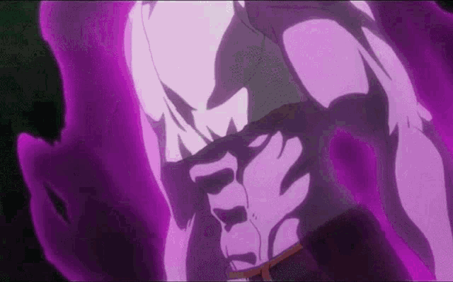 a close up of a person 's torso with purple glowing behind it .