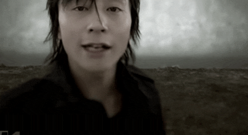 a close up of a person 's face with the number 4 visible in the corner