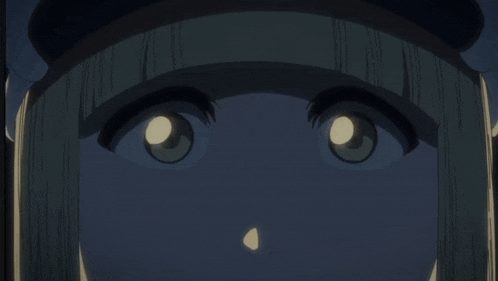 a close up of a person 's face with a glowing eye