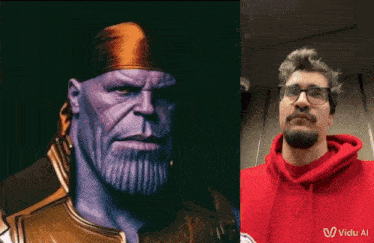 a man in a red hoodie is standing next to a picture of thanos
