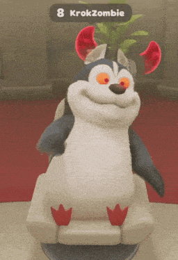 a cartoon penguin with red horns is sitting on a chair with the number 8 krokzombie above it