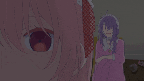 a girl with pink hair and purple hair looks at another girl