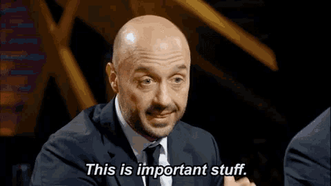 a bald man in a suit and tie is saying this is important stuff .