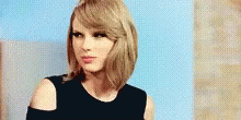 Squint Taylor Swift GIF - Squint Taylor Swift GIFs