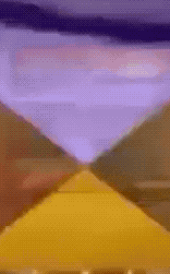 a purple and yellow painting with a pyramid in the foreground