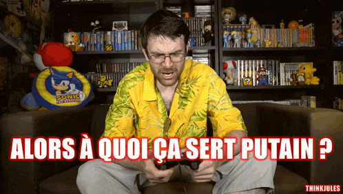 a man playing a video game with the words alors a quoi ca sert putain written below him