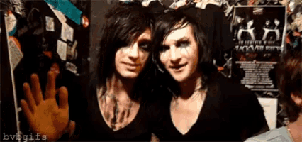 a couple of people standing next to each other with the words bvbgifs written on the bottom right