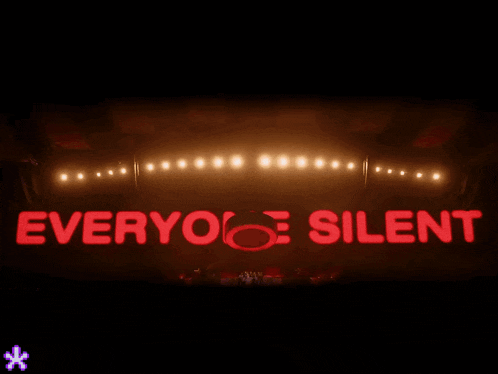 a large red screen with the word silent written on it