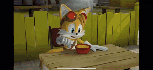 tails from sonic the hedgehog is sitting at a table eating from a bowl