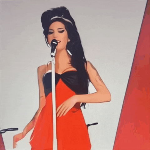 a woman in a red dress sings into a microphone