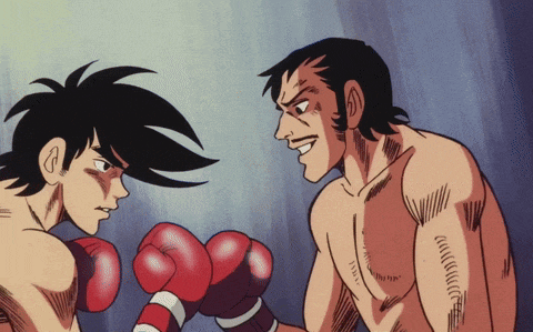 a cartoon of two men boxing with one wearing red gloves