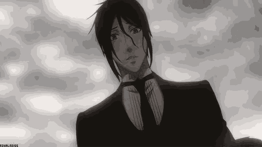 a black and white photo of a man in a suit and tie with a caption that says mishareiss