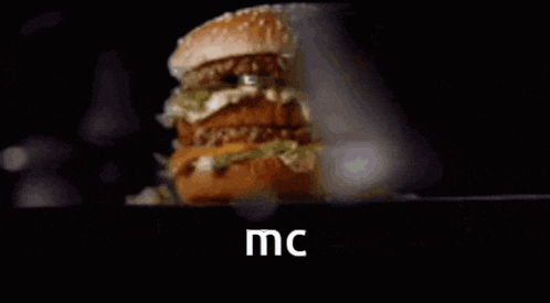 a close up of a mcdonald 's big mac sandwich