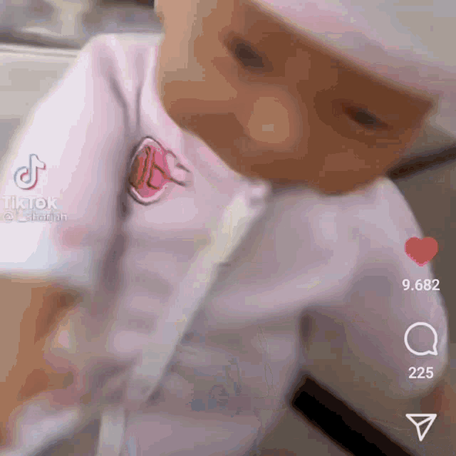 a tik tok video of a baby doll is being shared