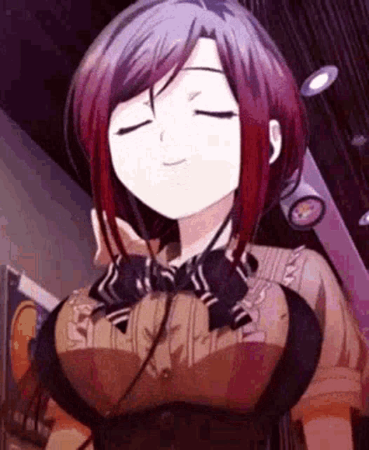 a close up of a girl with her eyes closed .