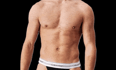 a man without a shirt is wearing a calvin klein underwear