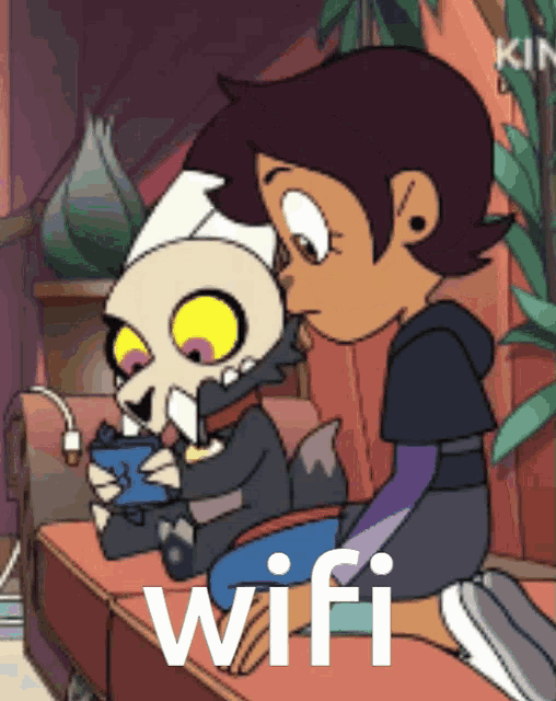 king and luz from the owl house are sitting on a couch playing a video game