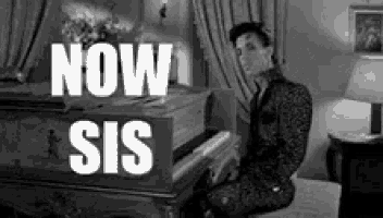 a black and white photo of a man playing a piano with the words now sis written above him