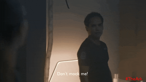 a man stands in a dark room and says " don t mock me "