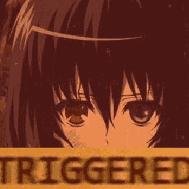 a close up of a girl 's face with the word triggered written on it