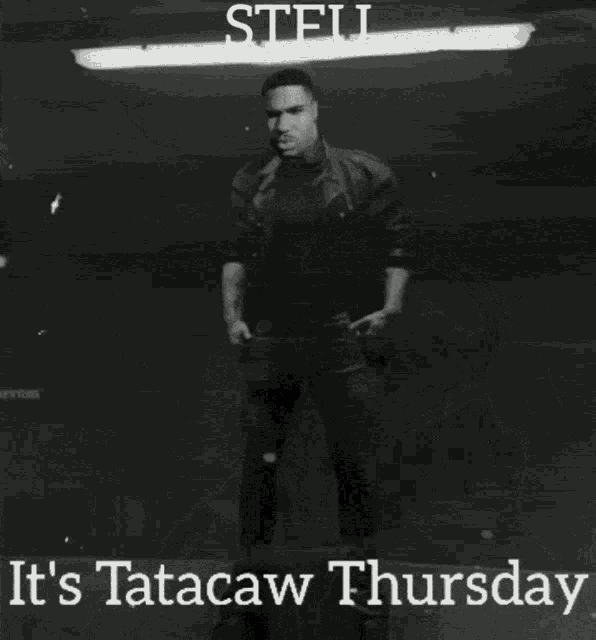 a black and white photo of a muscular man with the words stfu it 's tatacaw thursday