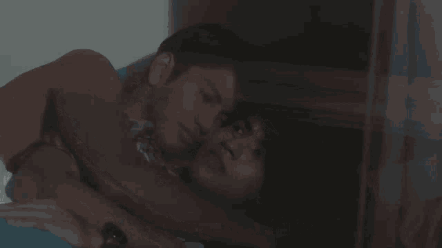 a man laying on top of another man with the words " hey are you naked " below him