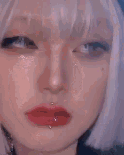 a close up of a woman 's mouth with red lips