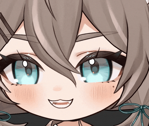 a close up of a girl 's face with blue eyes and a smile
