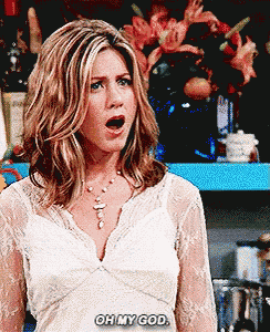 a woman in a white lace top is saying oh my god