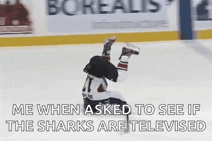 a hockey player is falling on his back on the ice while playing hockey .