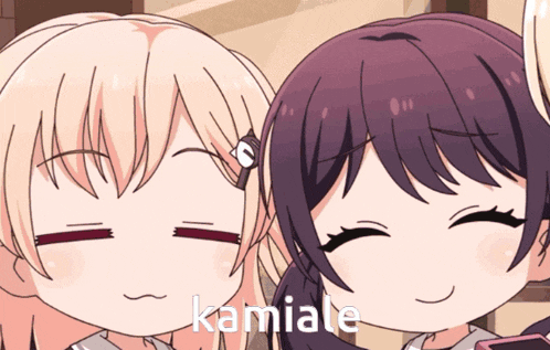 a picture of two anime girls with kamiale written on the bottom right