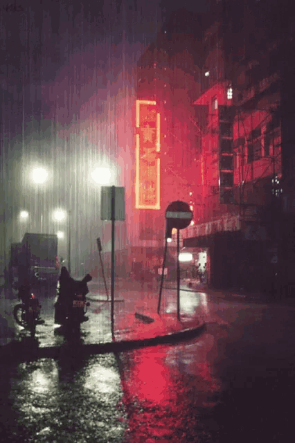 a sign that has chinese writing on it is lit up in the rain