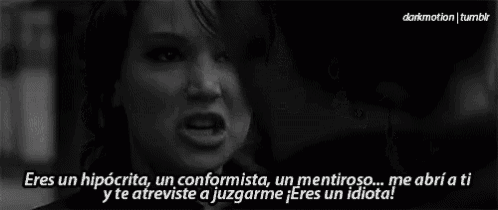 a black and white photo of a woman screaming with a quote in spanish
