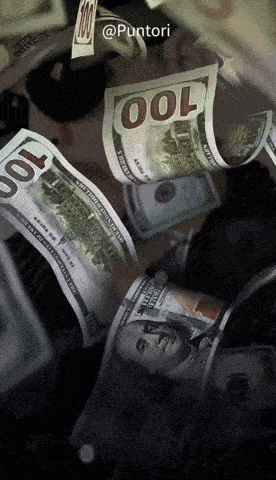 a pile of 100 dollar bills falling from the sky