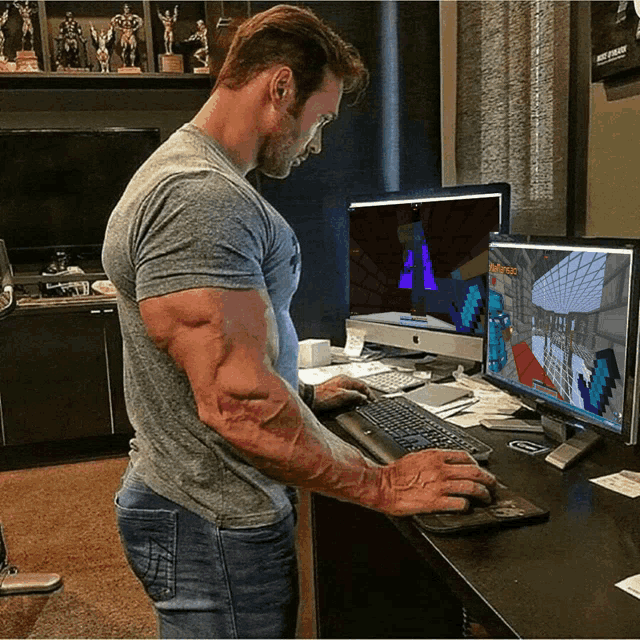 a man with very large muscles is playing a video game