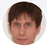 a close up of a man 's face in a circle with a white background