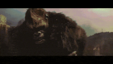 a close up of a giant gorilla in a movie