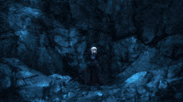 a blue background with a light coming out of the bottom