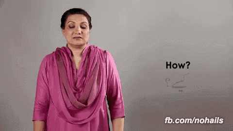 a woman in a pink shirt is asking how .