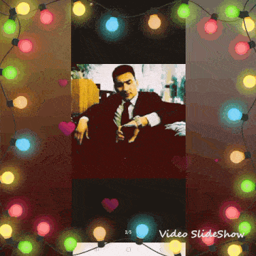 a picture of a man in a suit and tie is displayed in a video slideshow