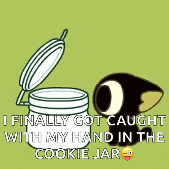 a cartoon cat is sleeping in a cookie jar