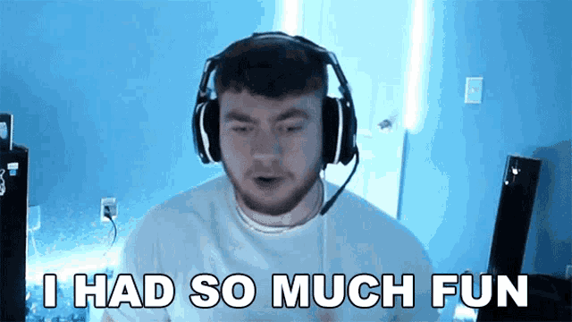 a man wearing headphones and a microphone says i had so much fun .