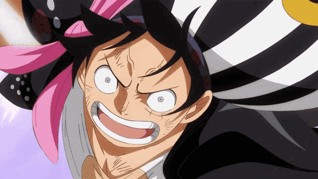 a close up of a cartoon character 's face with a pink flower in his hair