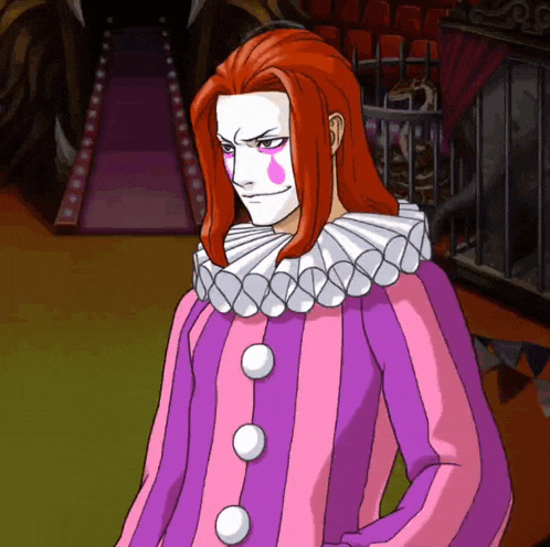 a clown with long red hair and a pink and purple outfit