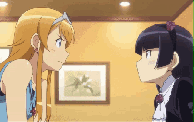 two anime girls are looking at each other in front of a framed picture