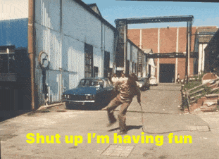 a man is jumping a rope with the words shut up i 'm having fun behind him
